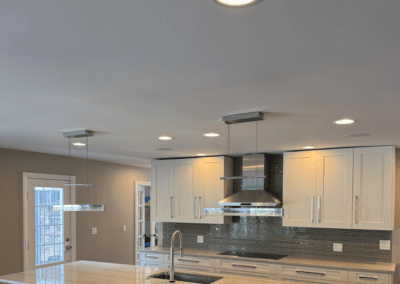 Freshly painted white kitchen cabinets and island in a Glenview kitchen